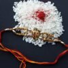Metallic-ganesha-on-om-Rakhi