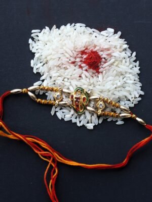 Metallic-ganesha-on-om-Rakhi