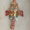 Orange-mukut-brass-ganesha-wall-hanging