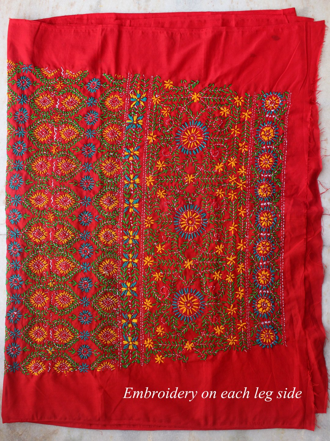 Yellow-blue-and-green-phulkari-on-red-bottom-fabric Yellow-blue-and-green-phulkari-on-red-bottom-fabric