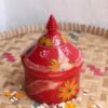 Yellow-flowers-on-red-wooden-sindur-dani