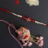 Red-and-pink-zari-kundan-baiya-bhabhi-Rakhi