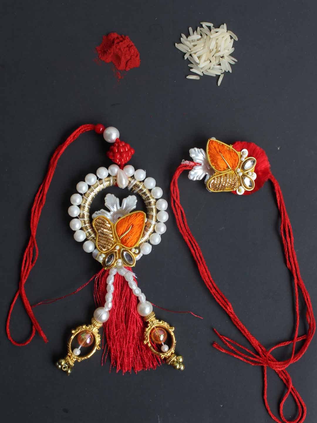 Red,-orange-golden-zariwork-Bhaiya-bhabhi-rakhi Red,-orange-golden-zariwork-Bhaiya-bhabhi-rakhi