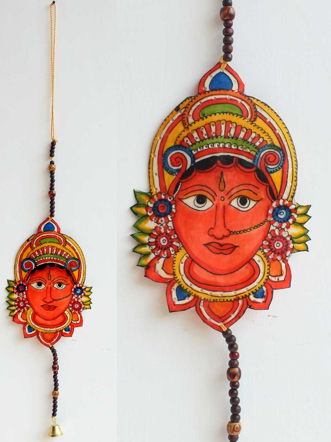 Orange-Goddess-face-tholu-Bommalata-wall-hanging Orange-Goddess-face-tholu-Bommalata-wall-hanging