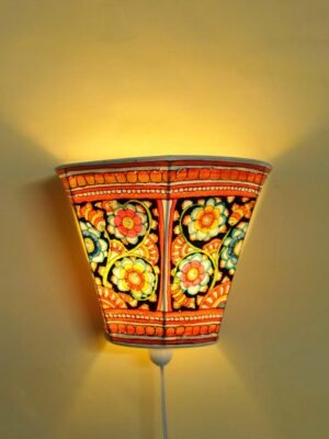 Floral-Black-Tholu-Bommalata-leather-wall-lamp at Shilphaat.com